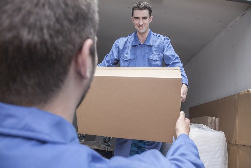 Packed moving boxes and furniture for a local home relocation