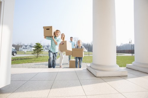 Furniture being carried through a residential building
