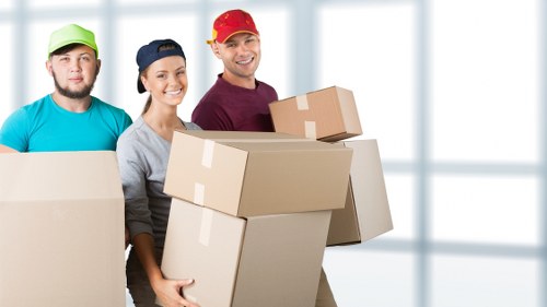 Packed moving boxes and household items ready for transport