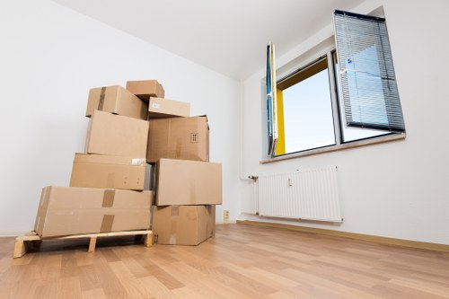 Removal team preparing household items for a UK move