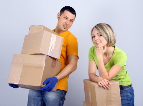Boxes and furniture ready for a local house removal service