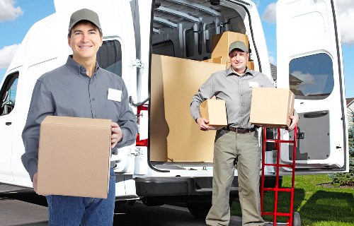 Careful wrapping of fragile household items for a local move