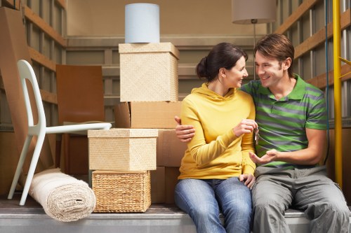Careful handling of household items during a South London man and van removal