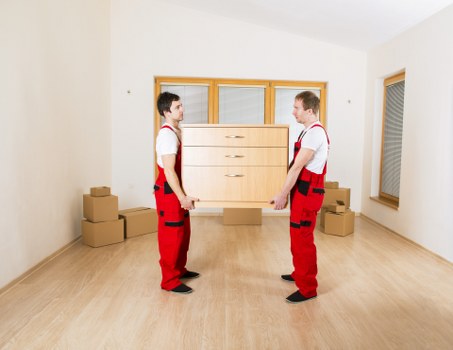 Professional movers handling a residential relocation in South London