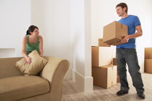 Loading furniture into a removal truck for a South London property move